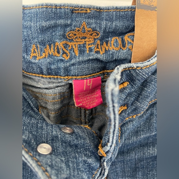 Y2K Blue distressed boot cut jeans with a medium wash and mid rise - Picture 2 of 7